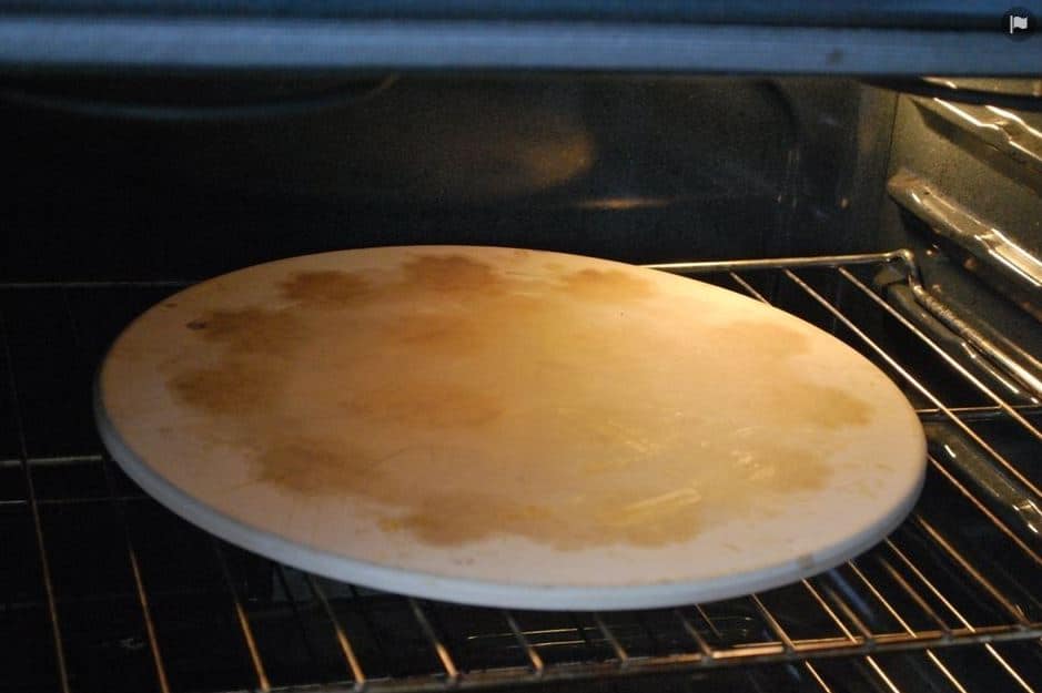 keto pizza preheating oven with a pizza stone inside
