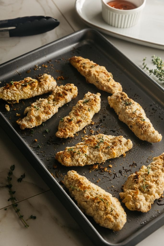 completed keto chicken tenders after being removed from the oven