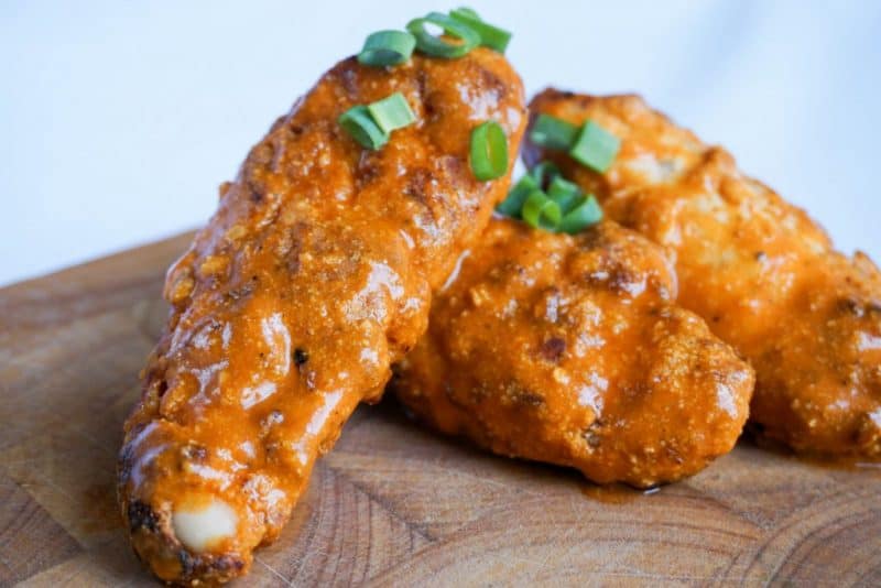 keto chicken tenders keto chicken tenders after being dipped in low carb buffalo sauce