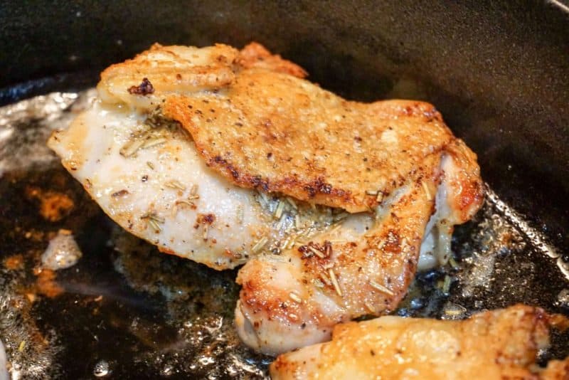crispy chicken thigh pan angle