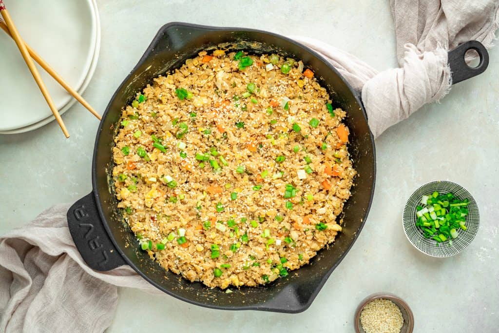 overhead of finished rice in a cast iron skillet