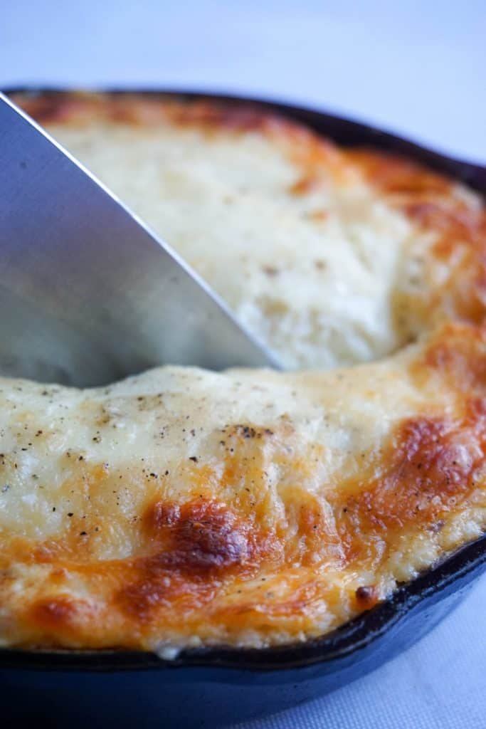 Keto Lasagna Cutting into keto lasagna