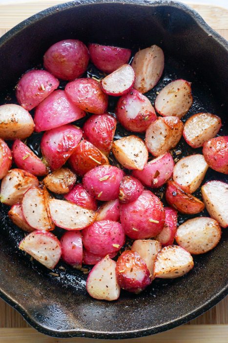 Keto Breakfast Bowl! Perfectly roasted radishes topped with sausage, cheese and a perfectly cooked egg!