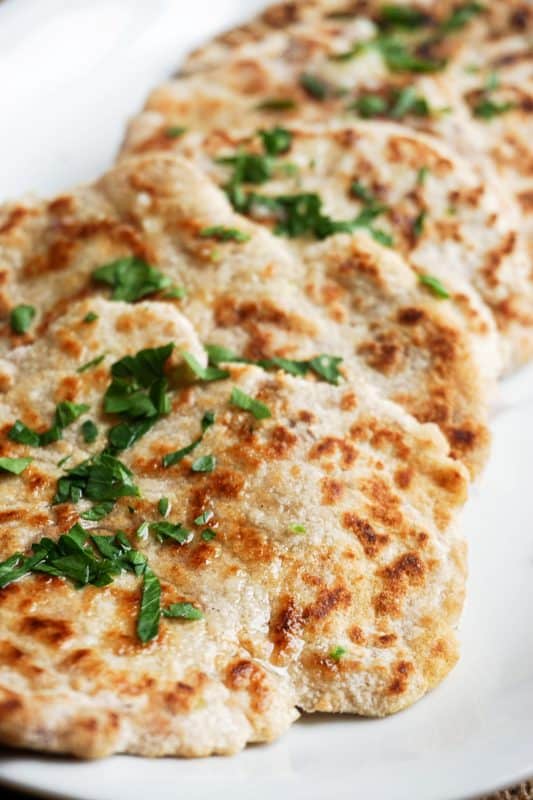 keto naan low carb keto naan on a plate with melted butter