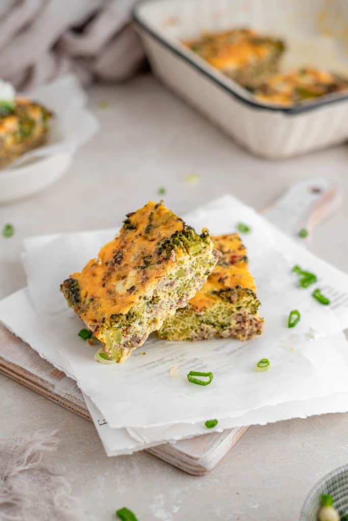 Two slices of casserole on top of parchment paper 