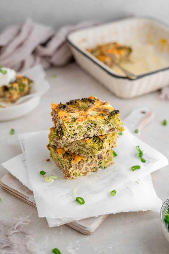 Keto breakfast Casserole Broccoli stuffed breakfast casserole slices with extra green onion