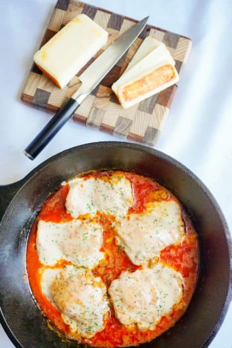 Your new favorite dinner is this low carb Buffalo Muenster Chicken Skillet with tender, cheesy chicken thighs in buffalo sauce! The perfect keto meal!