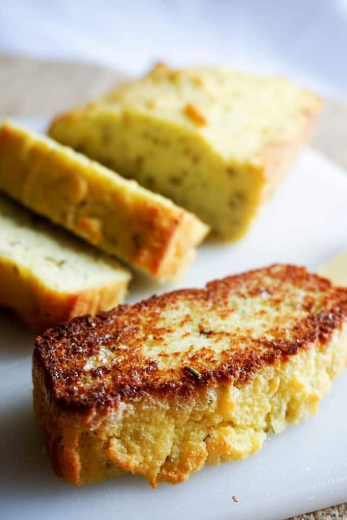 coconut flour bread with a slice toasted