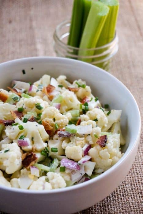 This Keto Cauliflower Salad recipe is the perfect summer time BBQ side dish packed with flavor and crunch in every bite!