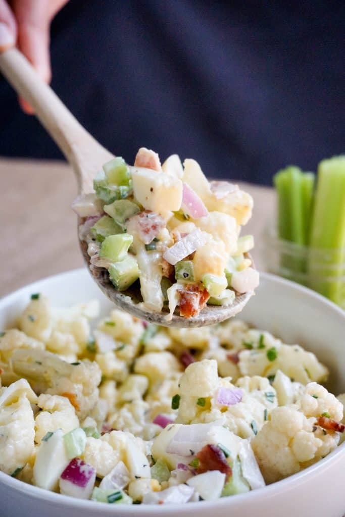 Scoop of Cauliflower Salad This Keto Cauliflower Salad recipe is the perfect summer time BBQ side dish packed with flavor and crunch in every bite!