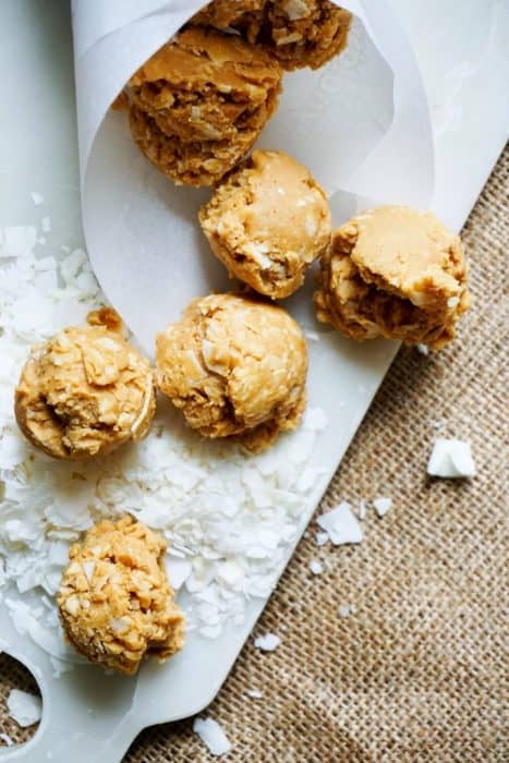 no bake peanut butter cookies displayed on a piece of parchment paper