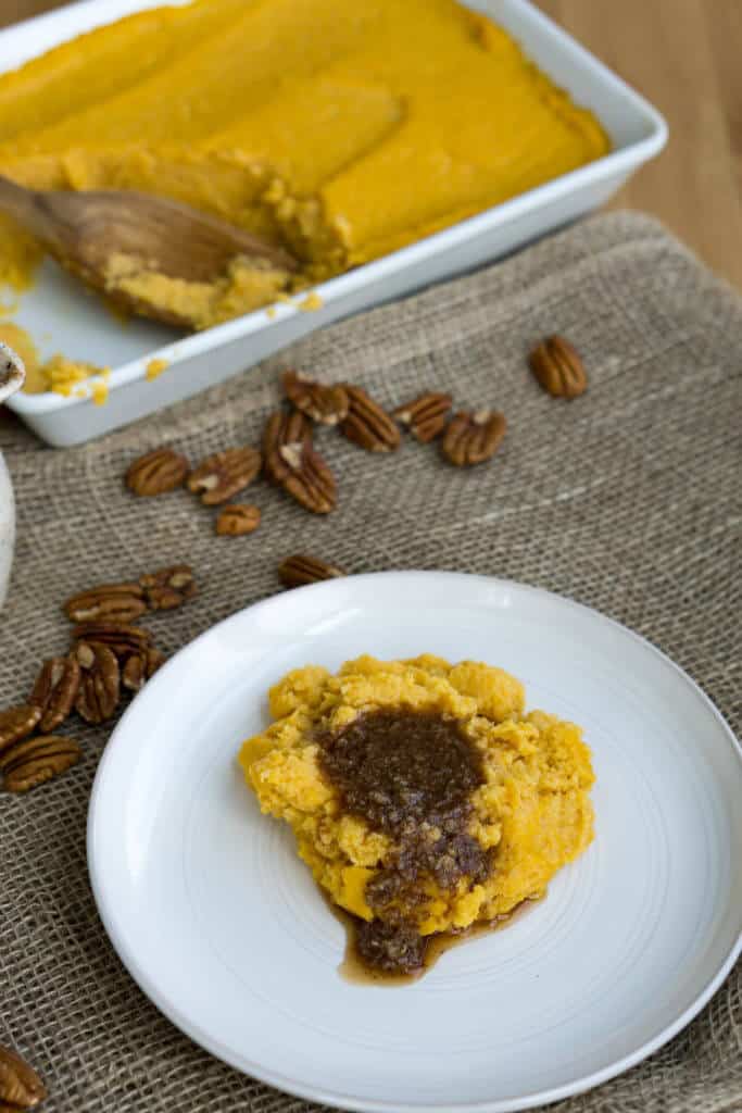 Scoop of Sweet Potato Casserole Our Healthy Sweet Potato casserole is the perfect, low carb, keto side dish to serve this year at Thanksgiving and you won't even know the difference!