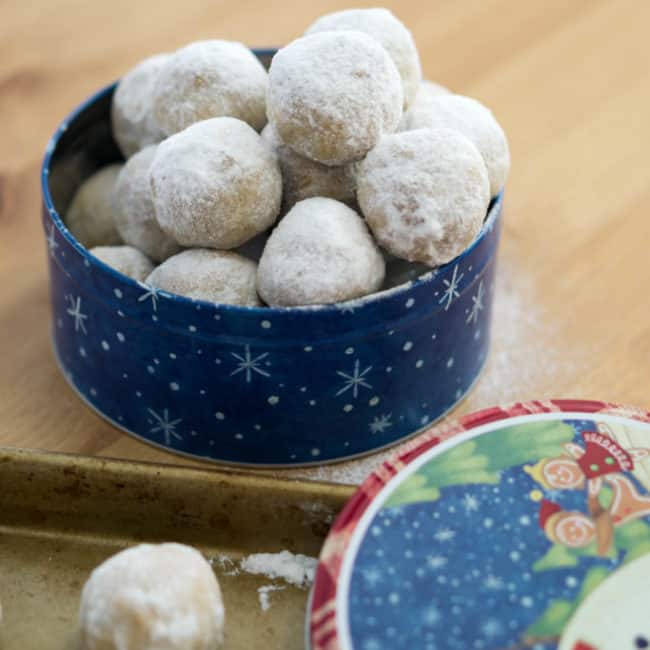 Walnut Snowball Cookies Snowball cookies on a cutting board