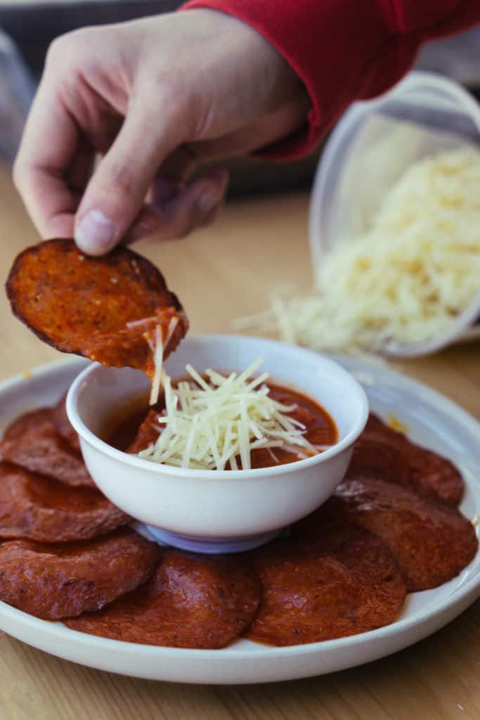 pepperoni keto chips dipped in pizza dip