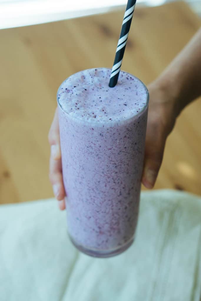 blueberry cheesecake smoothie and straw