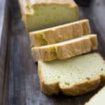 the best keto bread sliced and displayed on a wooden serving tray