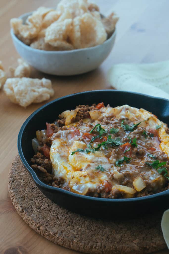 Our Easy keto Taco Dip uses the combination of a brie cheese wheel and delicious seasoned meat to give you the perfect, low carb appetizer!