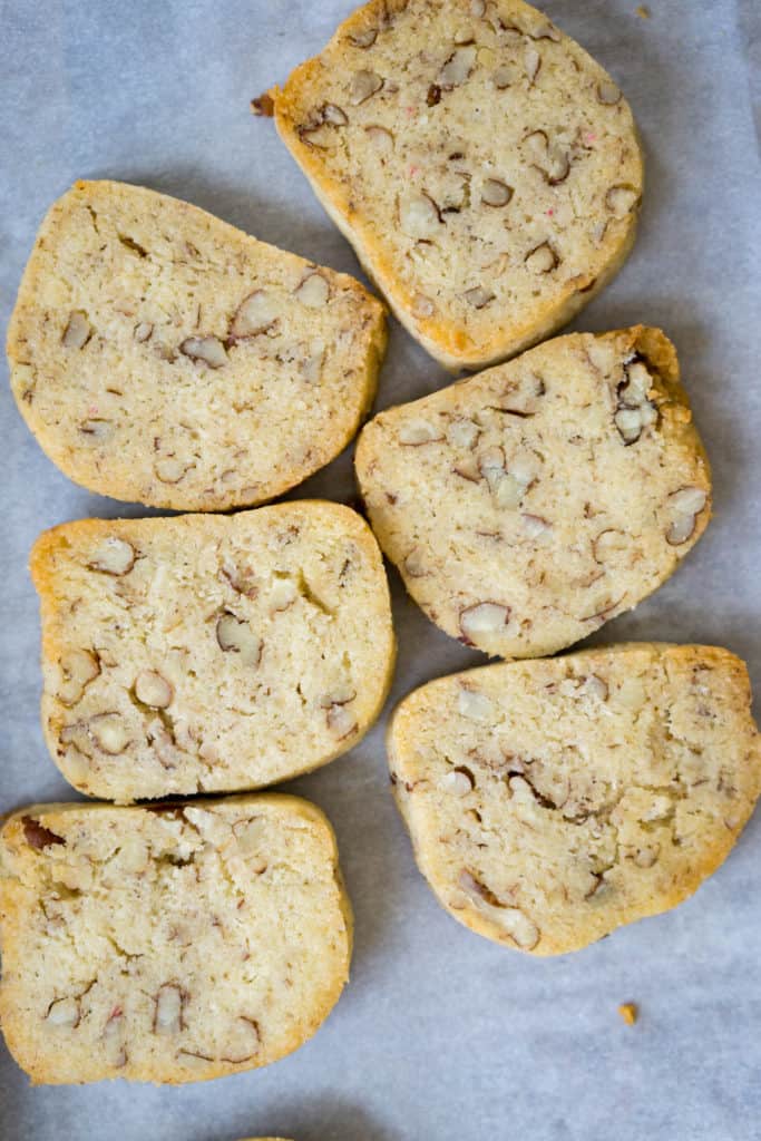 Sliced pecan shortbread on a cookie sheet