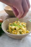 low carb curry egg salad being garnished