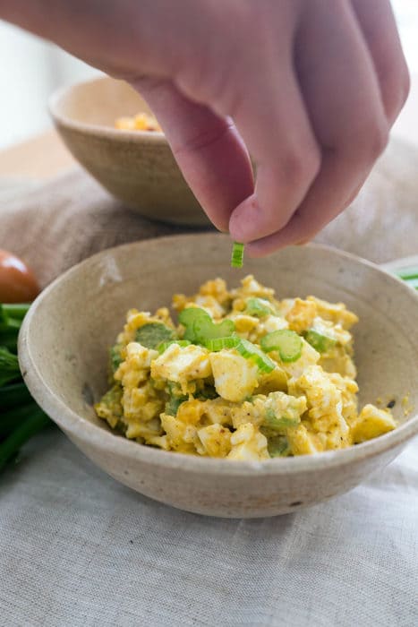 low carb curry egg salad being garnished