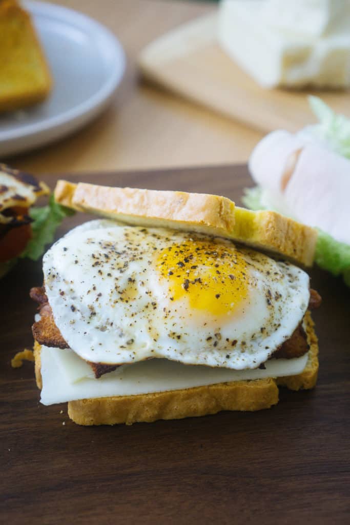 These keto break breakfast sandwiches use our best keto bread recipe and filling ingredients like eggs, meat and cheese!