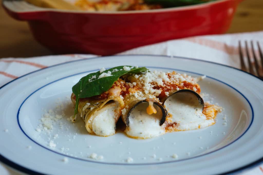 keto vegetarian recipes eggplant manicotti being plated and served