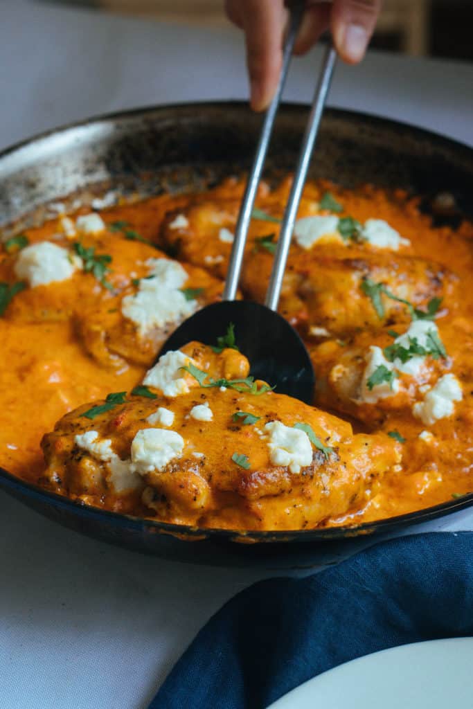 This Keto Chicken Thighs recipe is not only simple to make, but is packed with flavor from roasted red peppers and creamy goat cheese! 