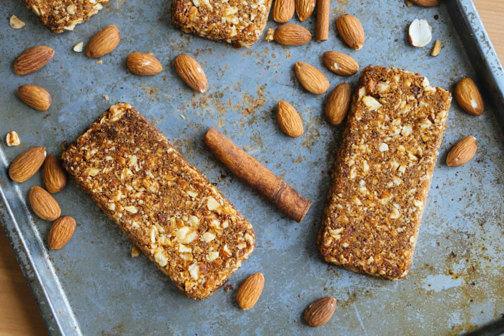 The low carb snack bars that you can buy at the store offer convenience, but the macros are a little questionable. These homemade keto snack bars take some baking, but macros will follow your keto diet better!  