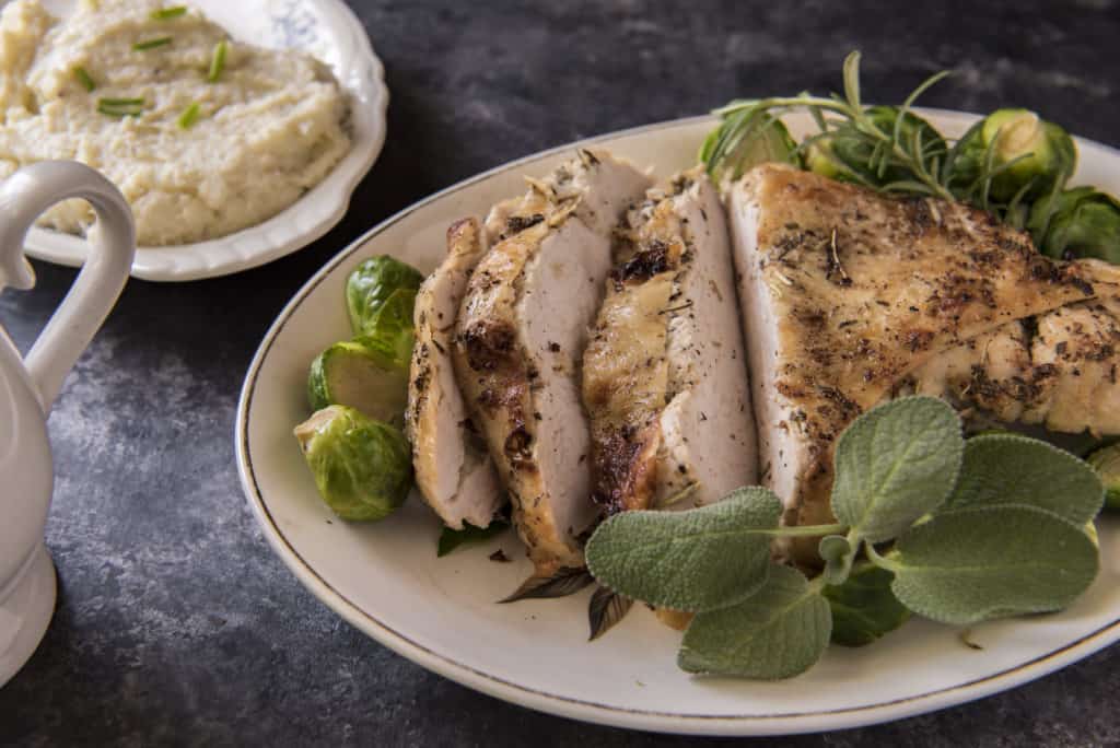 Our bone-in oven roasted turkey breast recipe is the perfect keto meal for celebrating this holiday season without all the stress of a giant turkey!