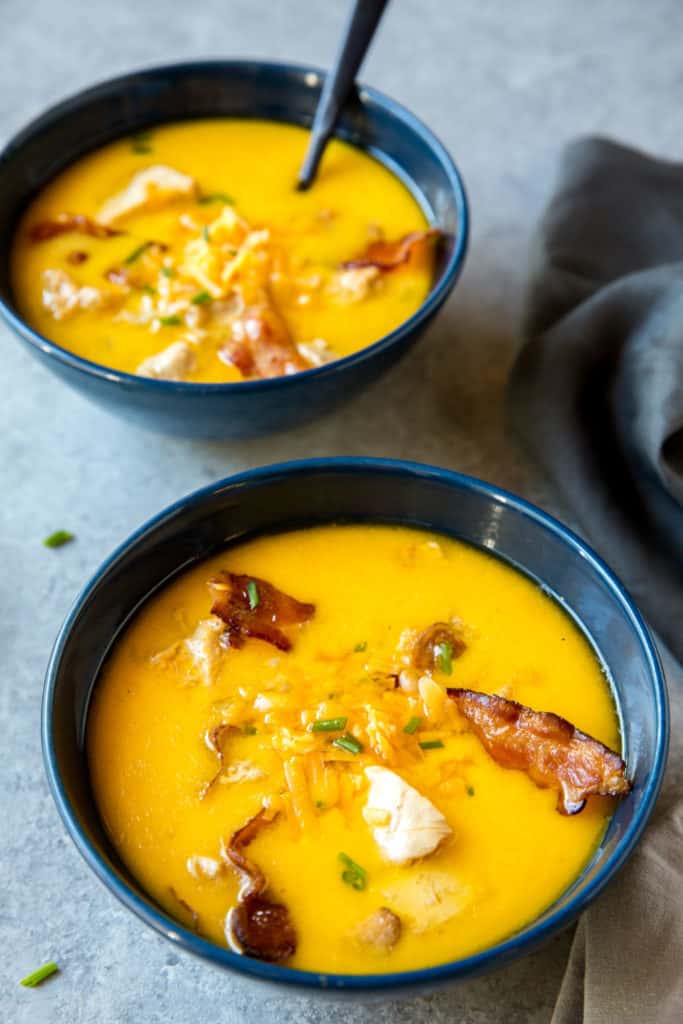 This easy keto Bacon Soup recipe is rich with cheddar and hearty with chunks of chicken and crumbled bacon!