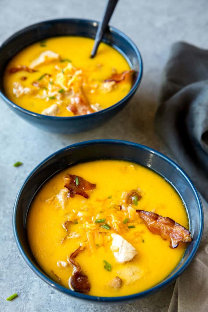 Two Bowls of Fresh Chicken Bacon Cheddar Soup This easy keto Bacon Soup recipe is rich with cheddar and hearty with chunks of chicken and crumbled bacon!
