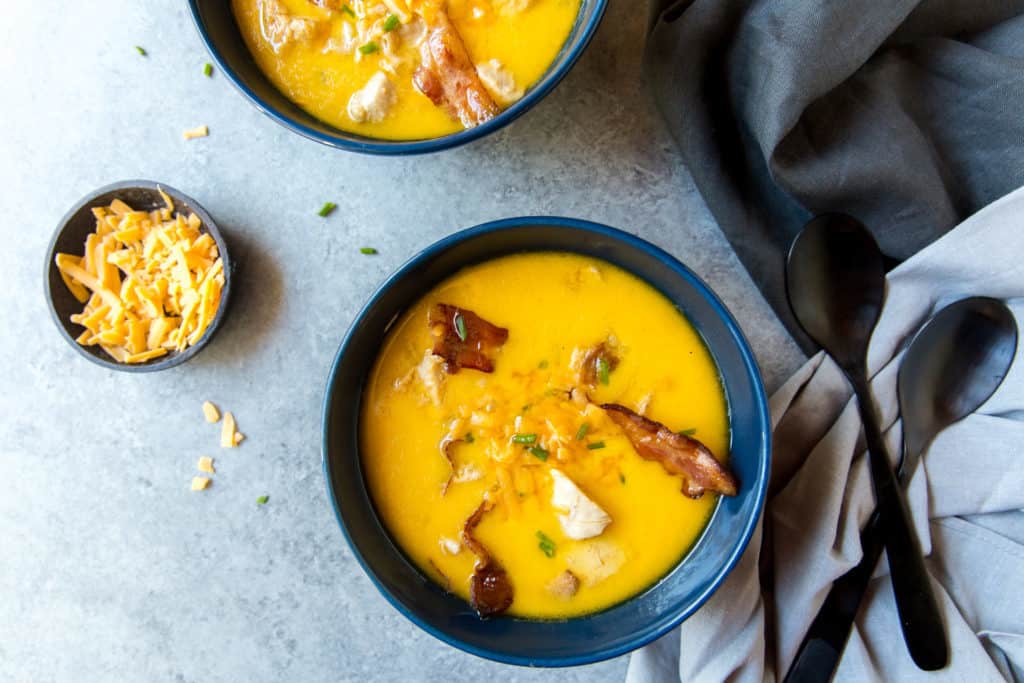 This easy keto Bacon Soup recipe is rich with cheddar and hearty with chunks of chicken and crumbled bacon!