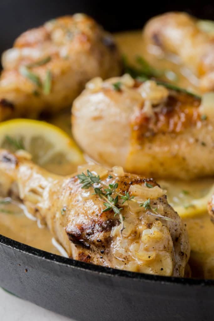 These Oven Baked Drumsticks combine tender chicken and a creamy butter and herb sauce for a busy weeknight dinner! Keeping the bone in chicken makes this recipe juicier, more nutritious, more fatty, and more flavorful!