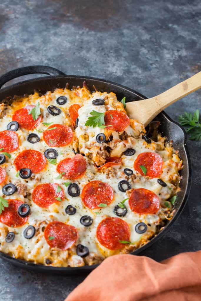 Our keto pizza casserole combines hearty sausage, tender cauliflower, cheese, and pepperoni to make a delicious final product. Making this pizza casserole can be turned into a whole family time activity!