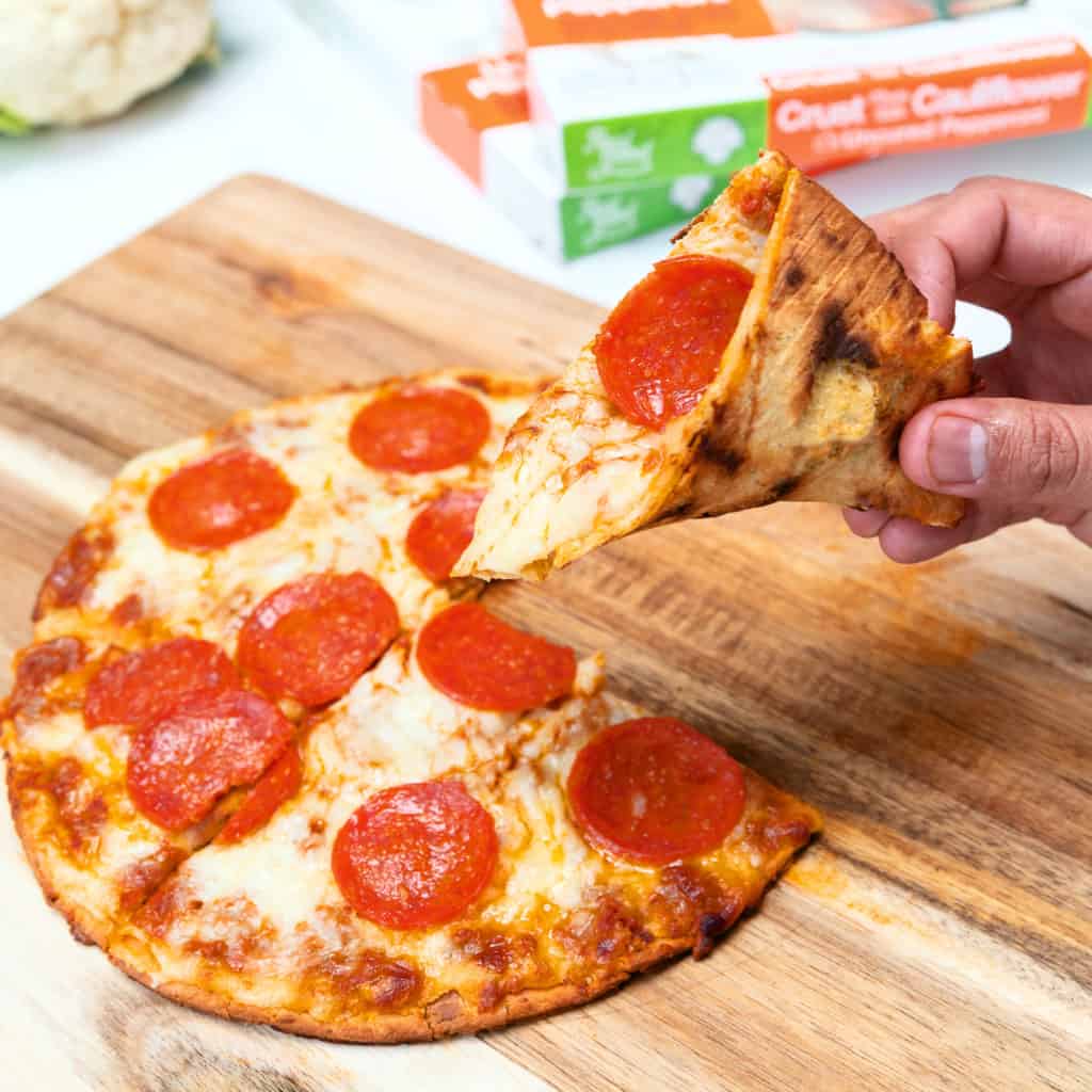 Frozen Realgood Foods Cauliflower crust pizza is a delicious and convenient keto diet friendly pizza. We would eat this pizza while on our keto diet.