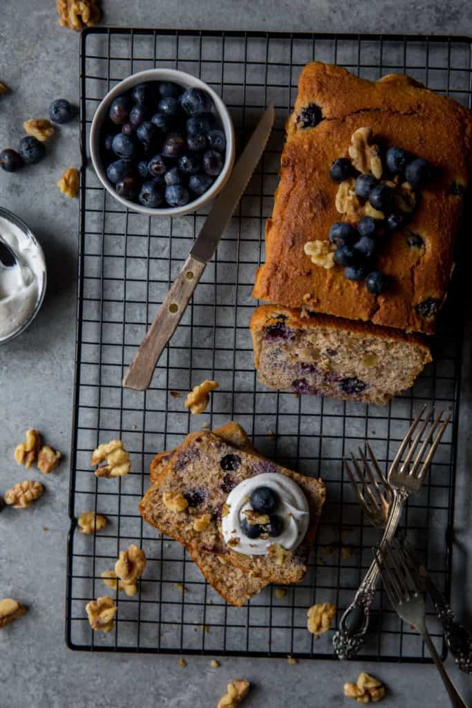 Our Blueberry Walnut Pound Cake vertical image of blueberry walnut pound cake
