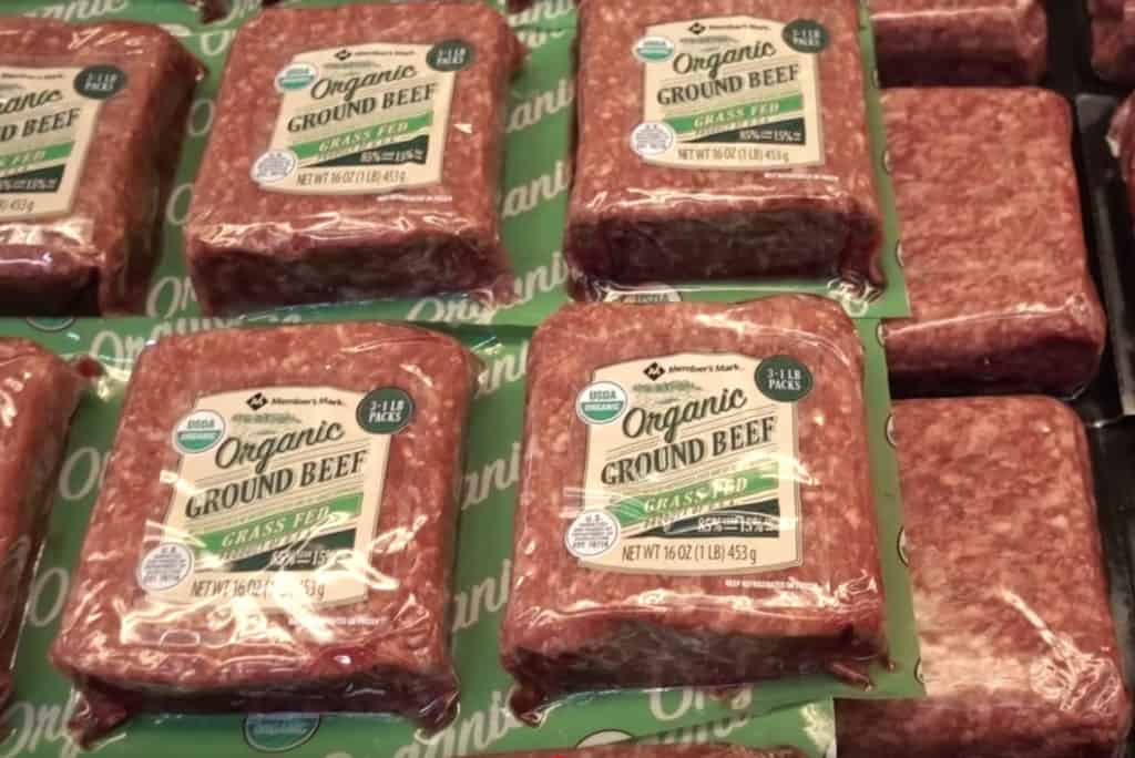 Packages of organic grass-fed beef in the refrigerated section at Sam's Club wholesale. 