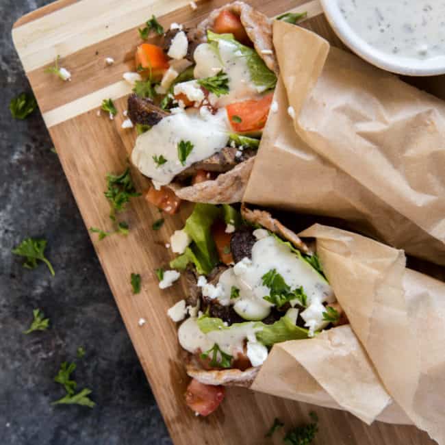 Healthy Gyros two healthy gyros on a cutting board