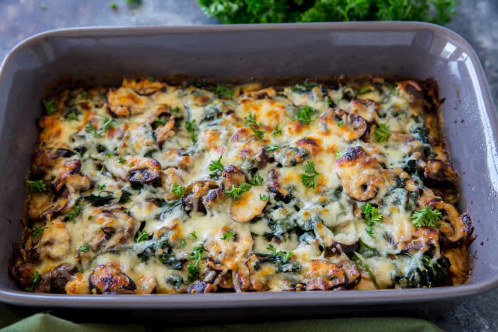 Keto Chicken Casserole baked keto chicken casserole in a gray casserole dish