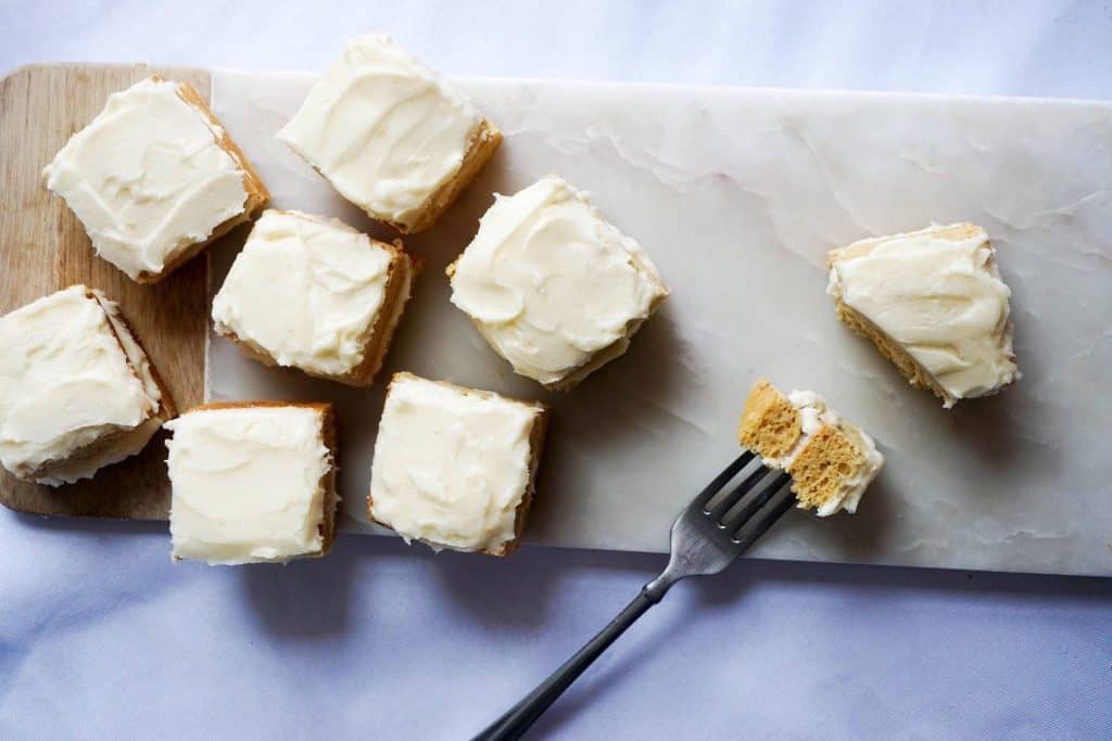 slices of iced vanilla protein cake 