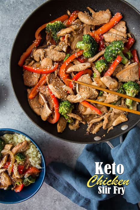 keto chicken stir fry in a frying pan and also plated over cauliflower rice