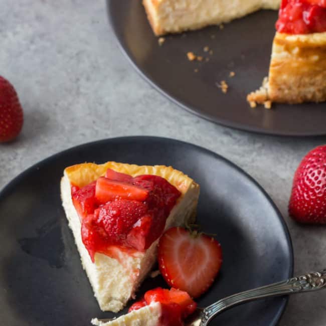 Keto Strawberry Cheesecake strawberry cheesecake with fork