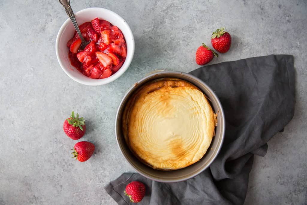 a deconstructed keto strawberry cheesecake on a black towel