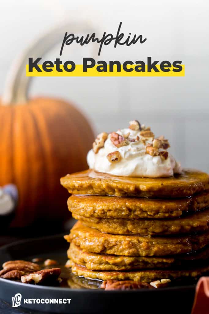 whip cream topped pancakes with pumpkin