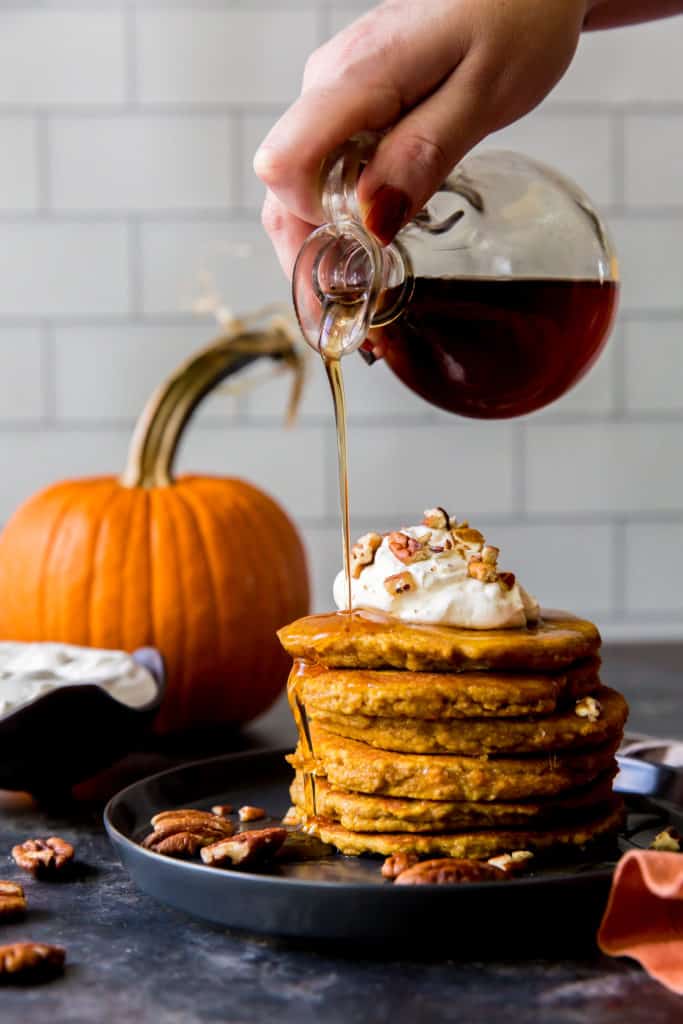keto pumpkin pancakes serving pancakes with syrup