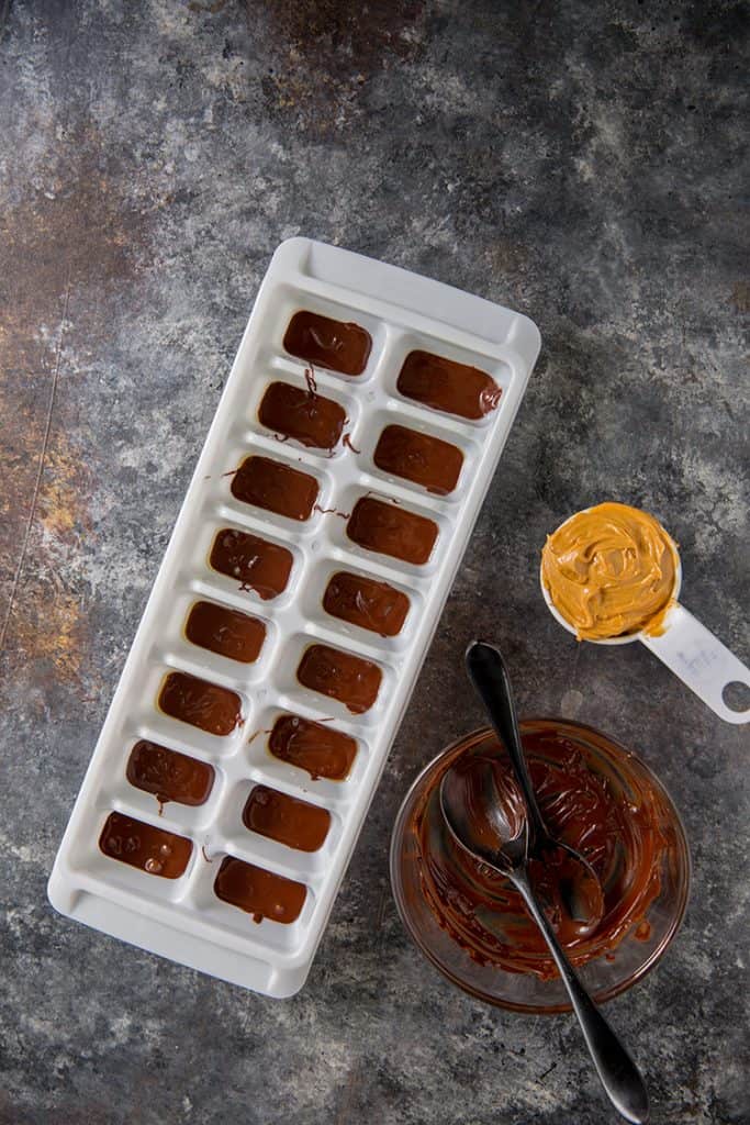 keto peanut butter cups tray filled with first layer only