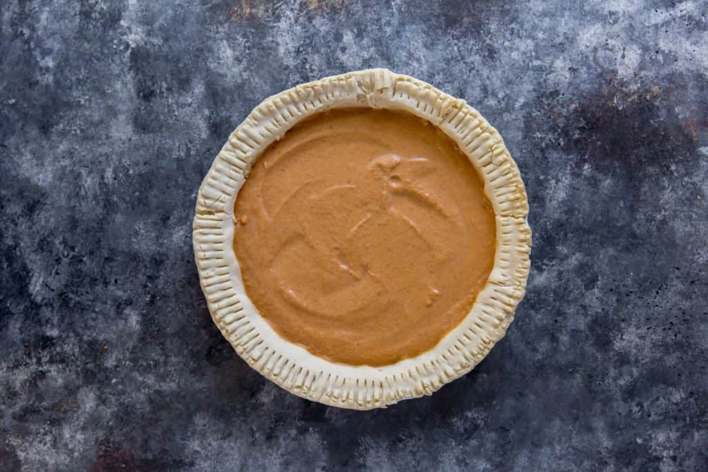 keto pumpkin pie before baking the pie for the second time