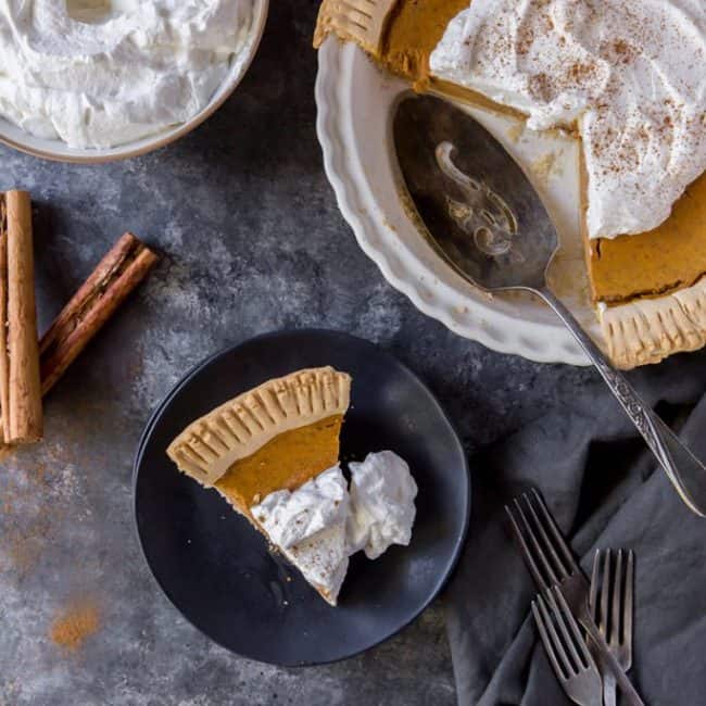 keto pumpkin pie serving spoon and slice on a plate for dessert