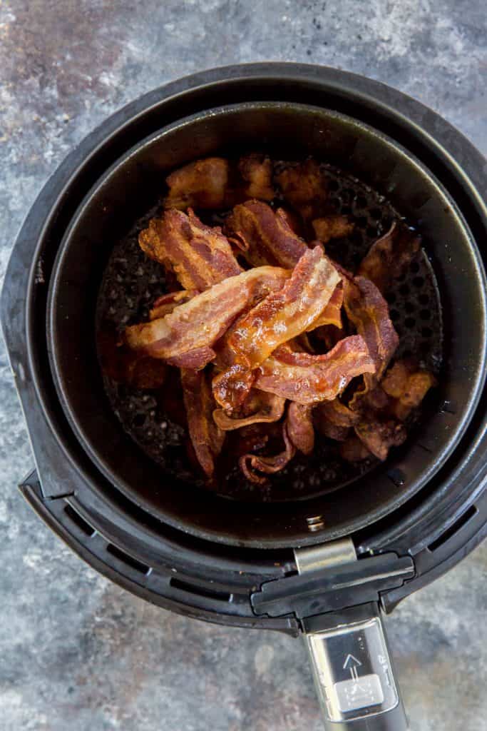 Air fryer bacon Bacon curing onto one another freshly cooked inside the air fryer