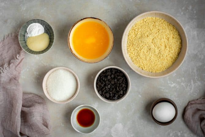 Bowls full of cookie dough ingredients side by side. 